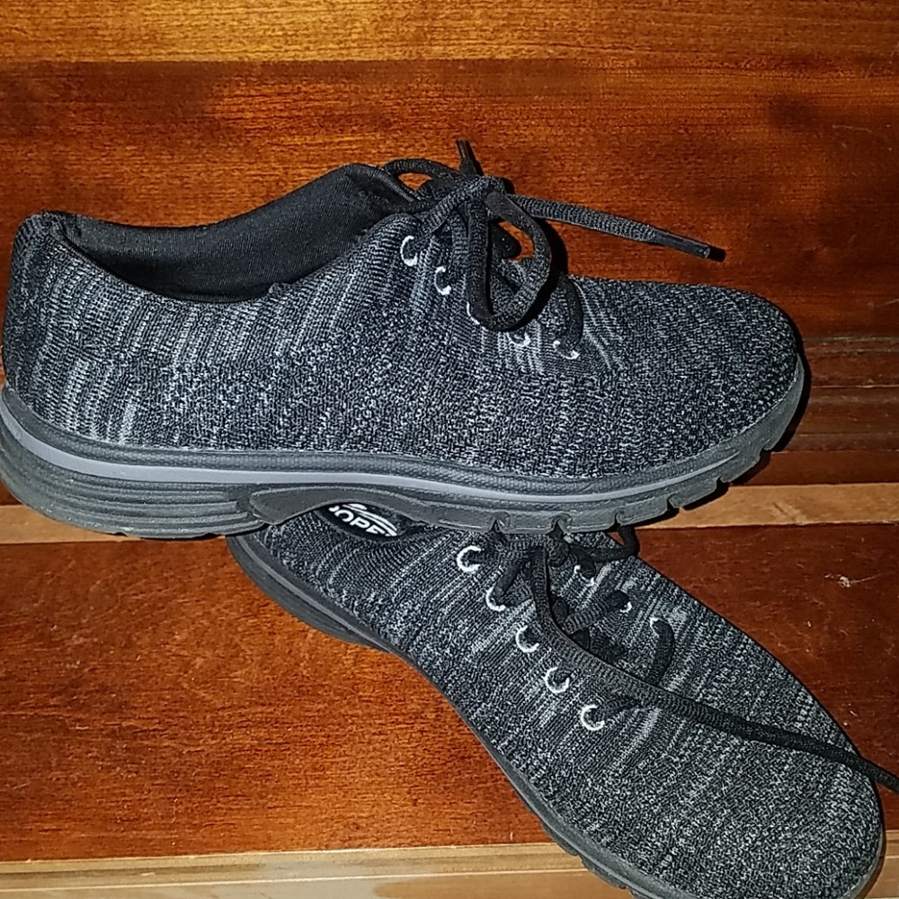 Black lace up tennis shoes